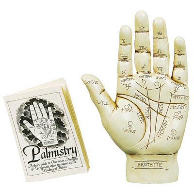 Konsten att sp i hnderna - hand 20cm med palmistry bok